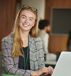 A female student with a laptop